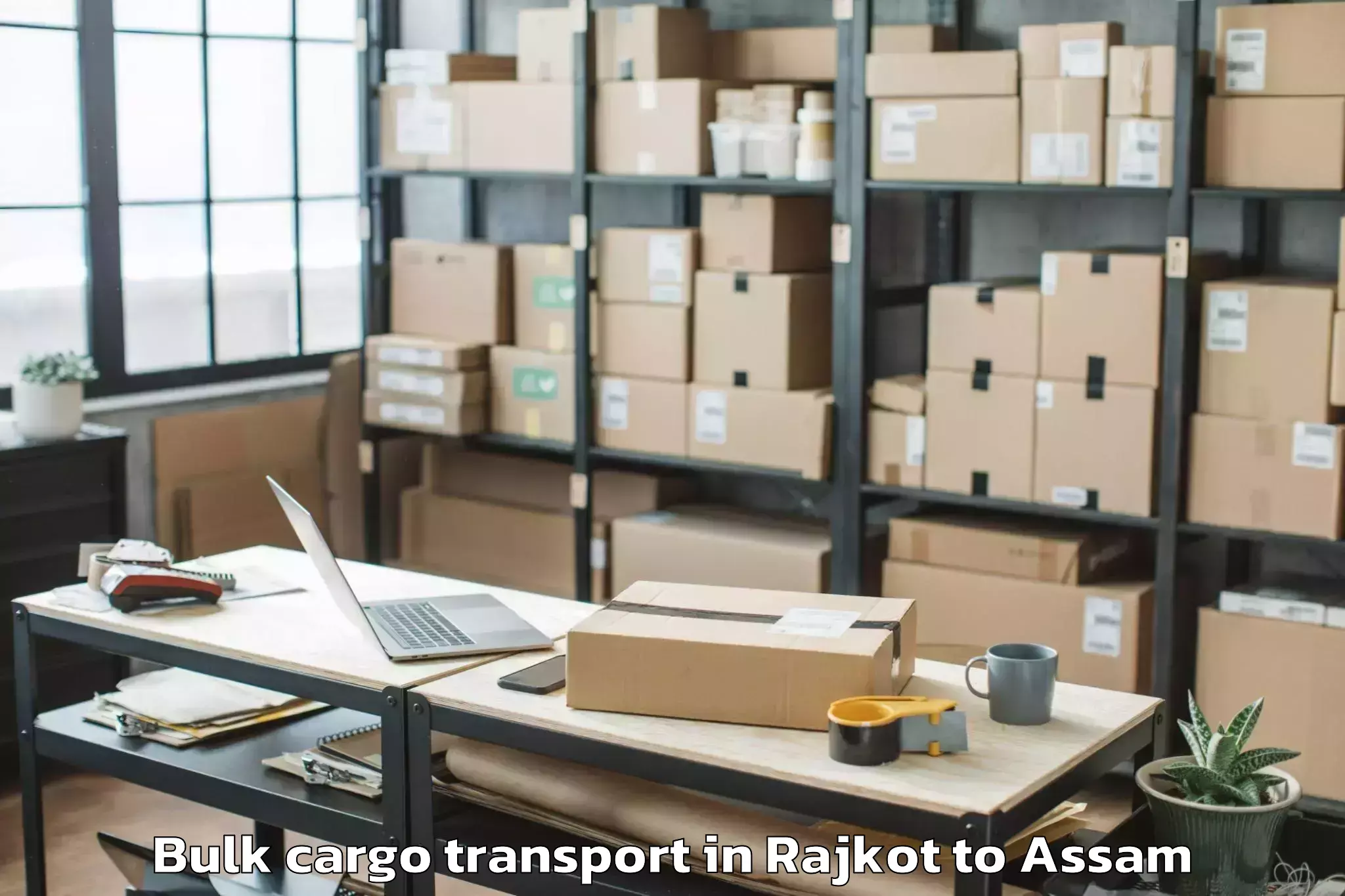 Book Rajkot to Gauripur Bulk Cargo Transport